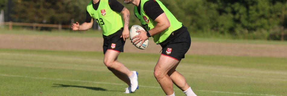 Rhys Williams running with the ball.